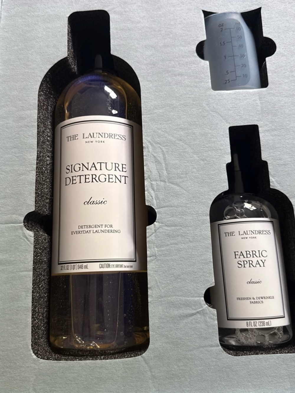 The Laundress Signature Detergent & Fabric Spray Set in Clear/White